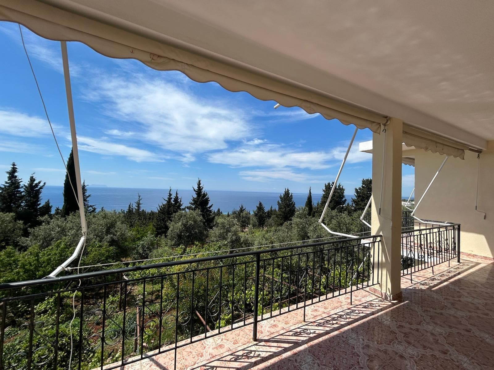Kristaqi Rooms terrace overlooking the Ionian Sea